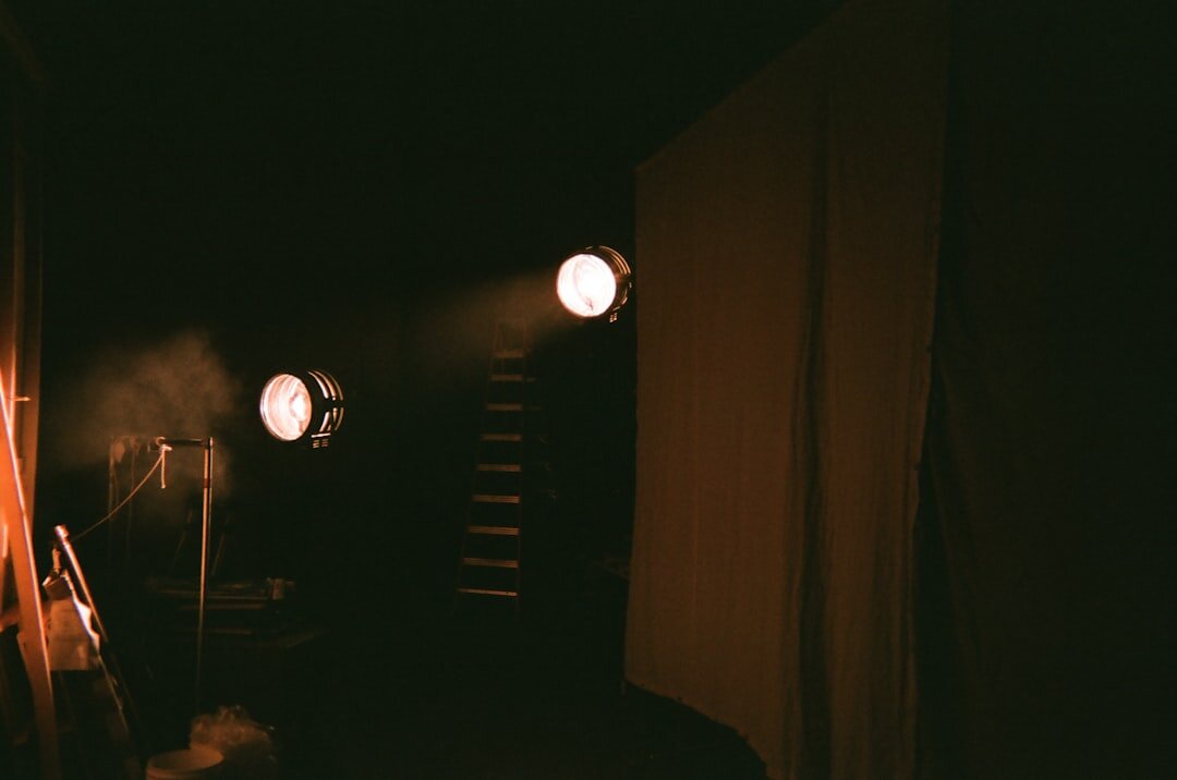 Sound technician testing audio equipment backstage